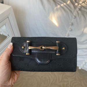 black gucci wallet with buckle